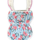 Miki Miette baby romper back view with cherry and stripe pattern on a white background