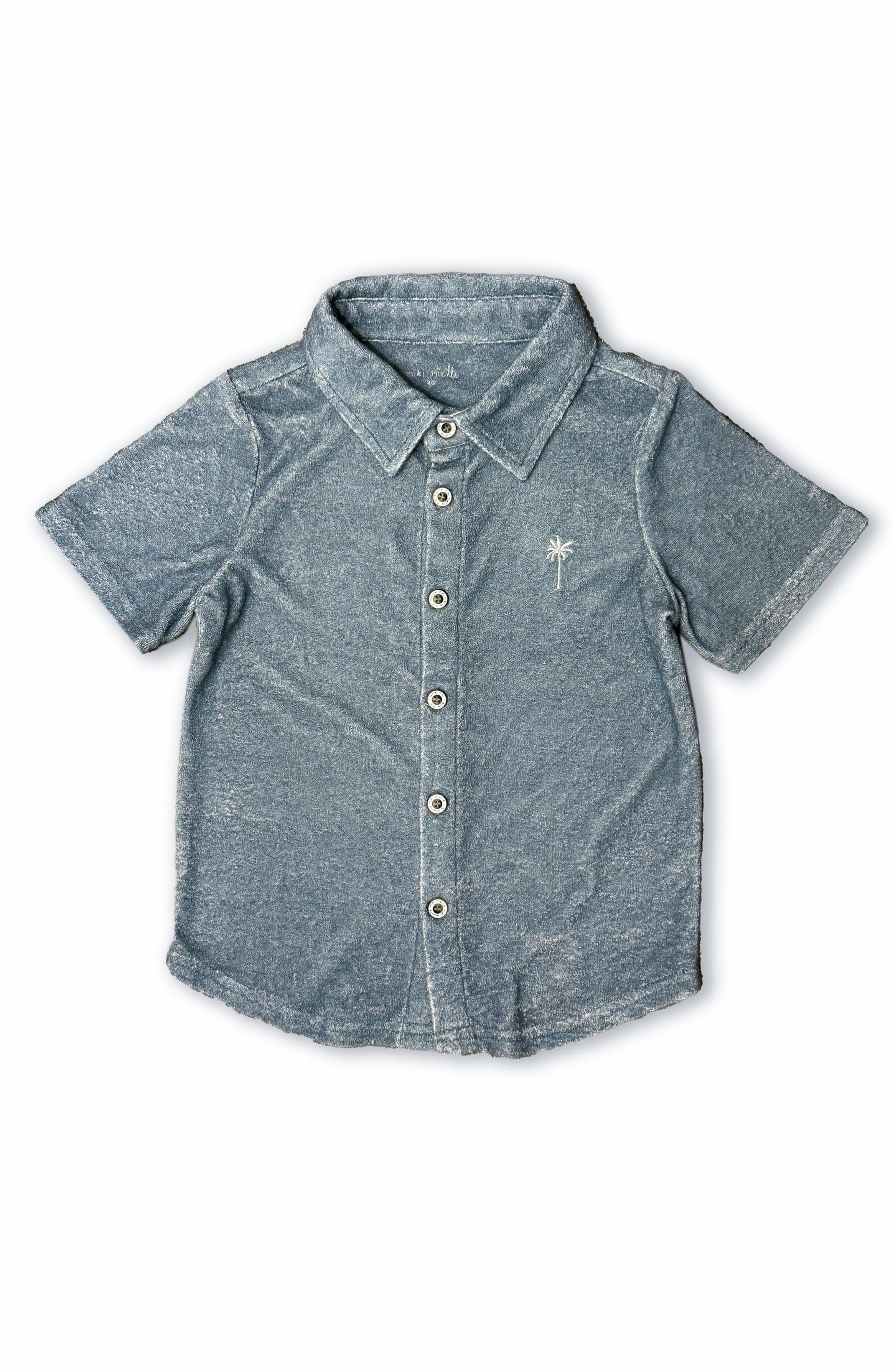 Miki Miette blue button-up shirt with a small palm tree logo on a white background