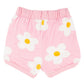 Pink shorts with white daisy flowers on a white background