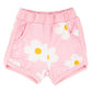 Pink shorts with white daisy flowers on a white background