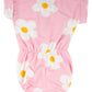 Pink romper with daisy flower patterns on a white background