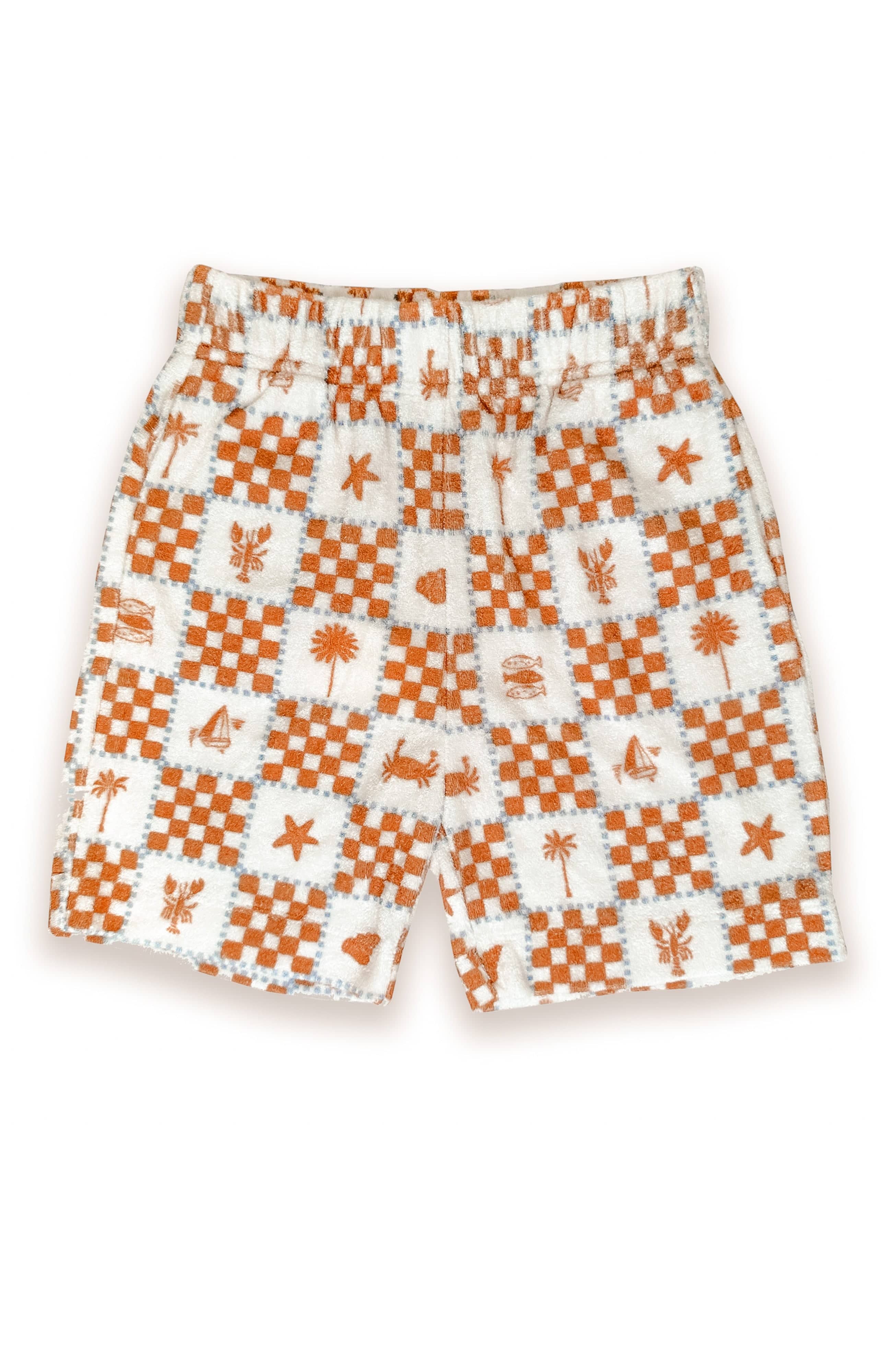 Shorts with a pattern of orange and white squares on a white background